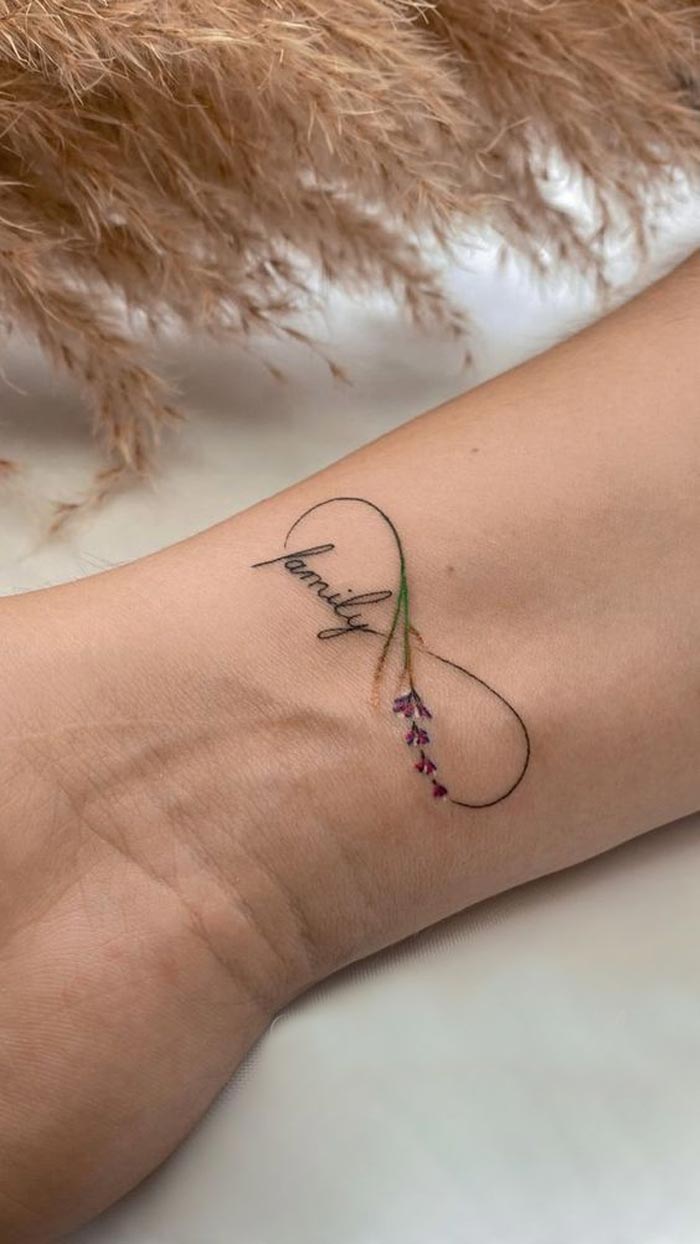 Letter with infinity tattoo