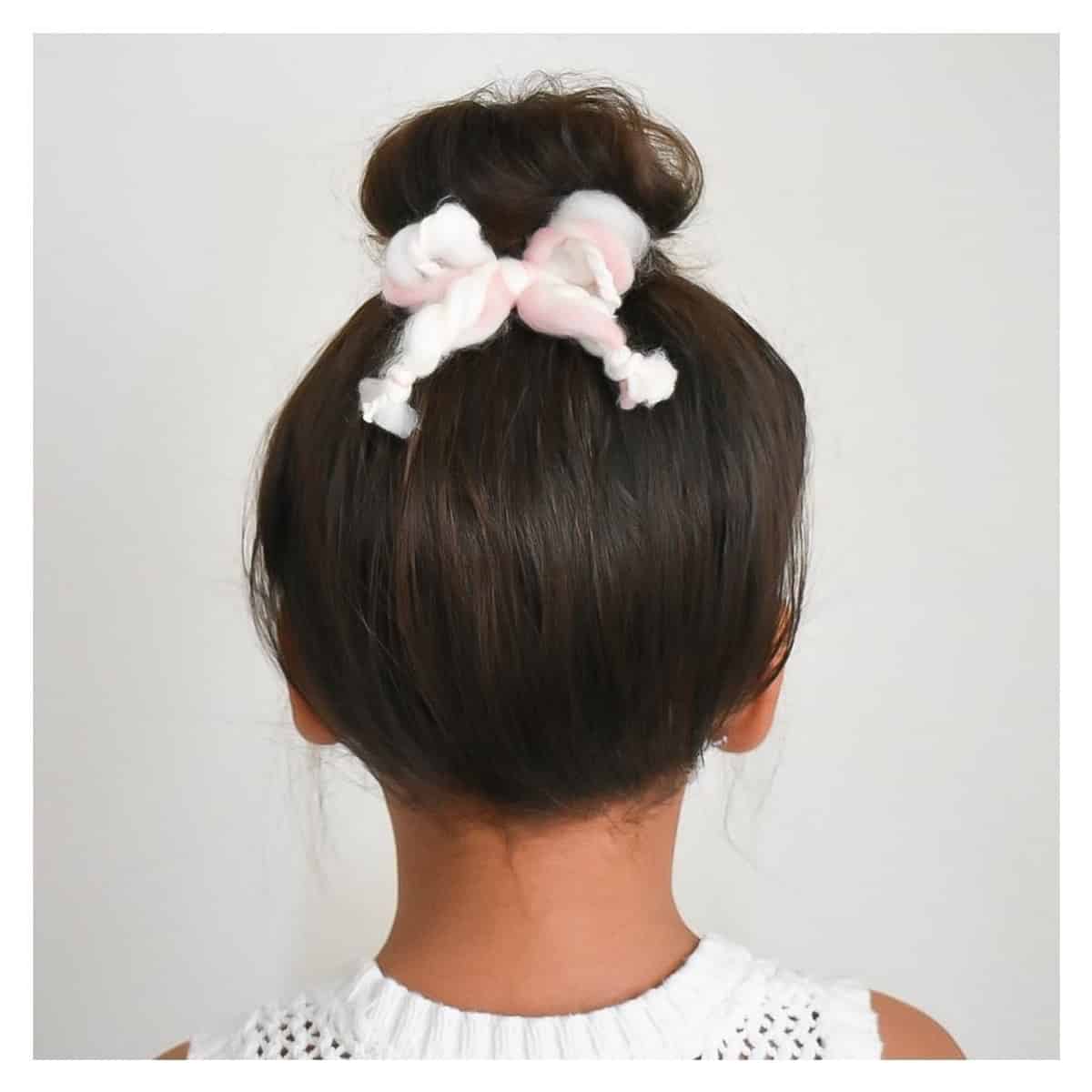 Short Top Knot Style For A Toddler