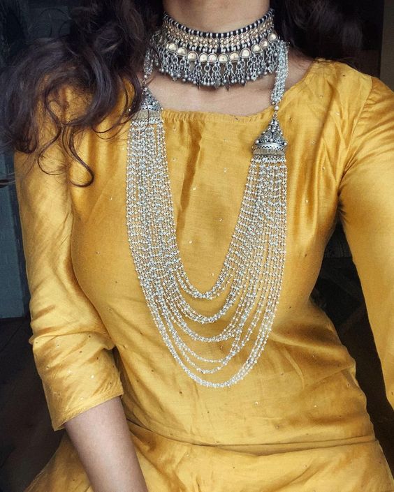 solid colour kurti with layered necklace