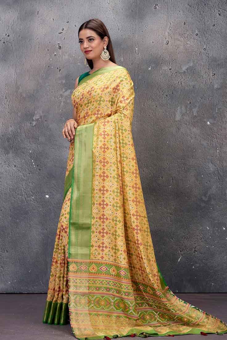 Yellow Patola Silk Saree With Green Zari Border