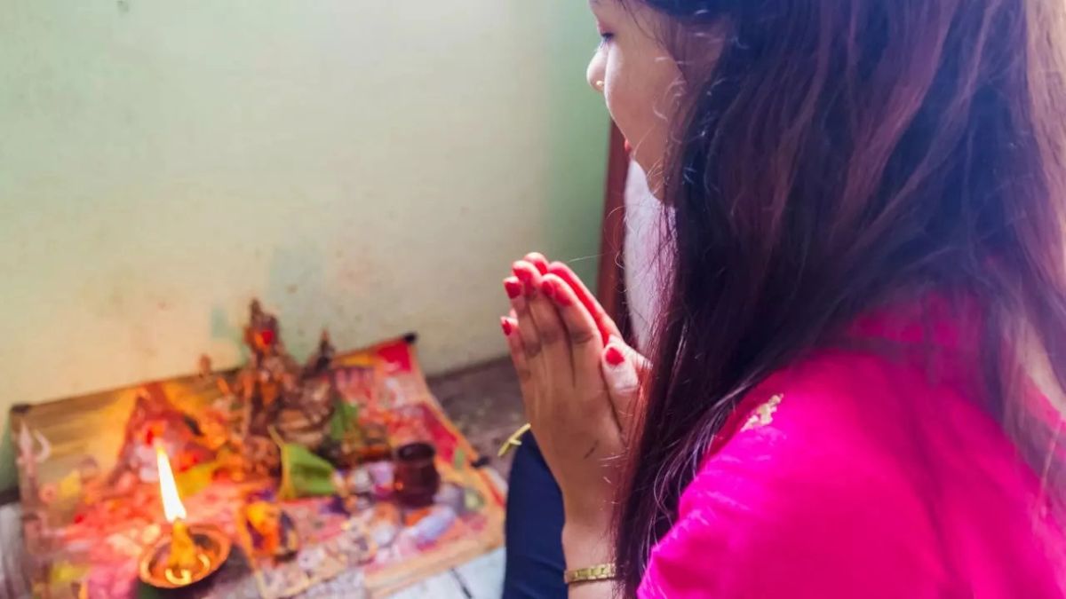 lighting flour diya with mustard oil on hartalika teej