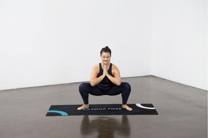 malasana pose to fight constipation benefits and the right way to do it 