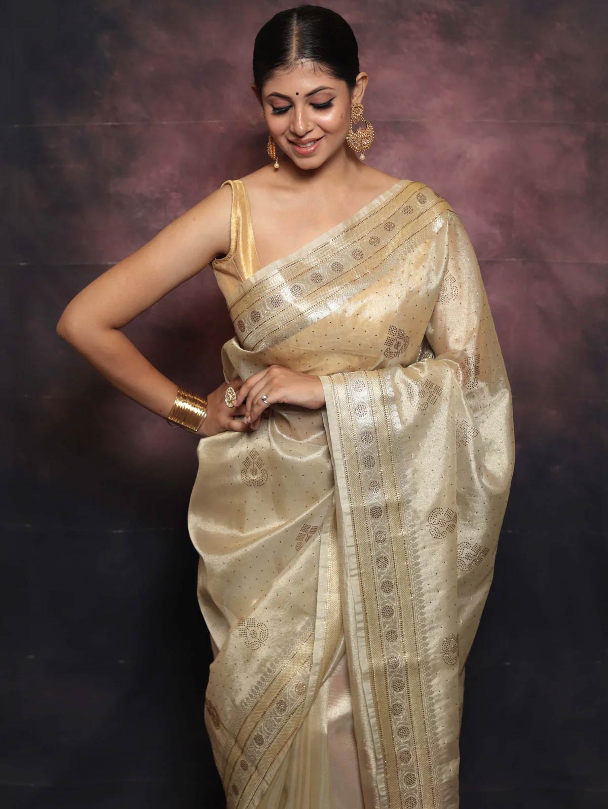tissue silk golden saree designs