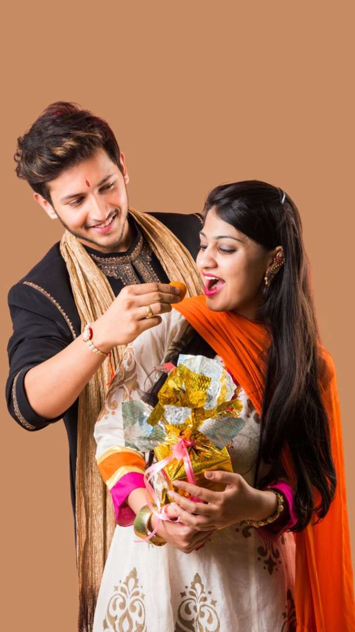 A YOUNG WOMAN HAPPILY CELEBRATING RAKSHABANDHAN WITH BROTHER Stock Photo -  Alamy