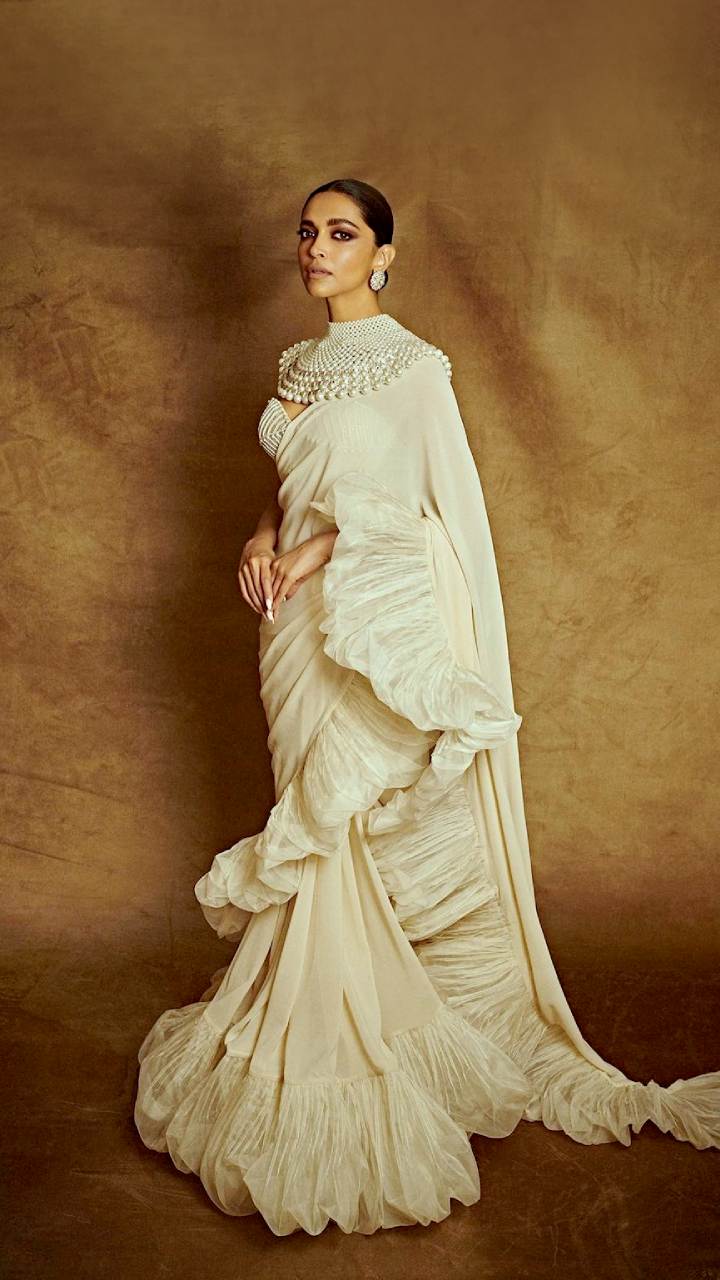 Creamy Beige Dripping Foliage Saree Gown | Heavy dresses, Saree draping  styles, Saree gown