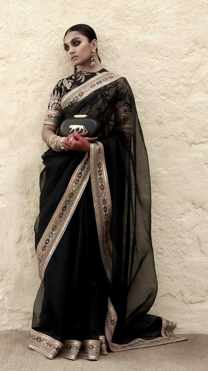 Party Wear Sarees : Black net heavy sequence and thread embroidered ...