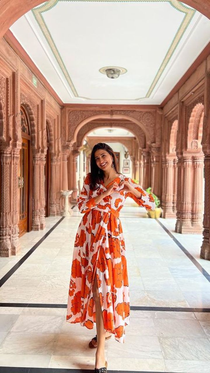 Aahana Kumra Is A Flamboyant Fashionista In Her Sheer Orange Dress